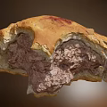 Golden Crusted Meat Pie With Savory Meat Filling And Bitten Appearance