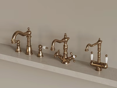 Three Classic Brass Faucets Arranged On Light Countertop With Elegant Handles 3d model