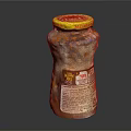 Spicy Sauce Glass Jar With Yellow Lid And Orange Content On Dark Background