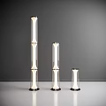Modern Floor Lamps Set of Three with Varying Heights Transparent Glass Tubes and Sleek Design