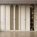 Modern Light Colored Wardrobe With Arched Doors Lattice Panels And Open Compartment Holding Bags
