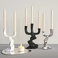 Modern Candle Holders White Black And Silver With Wavy Design And Lit Candle On Tray