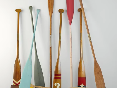 Sports Equipment Colorful Rowing Paddles with Various Designs Neatly Leaning Against White Wall 3d model