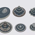Various Decorative Garden Ornaments With Different Shapes And Textured Layered Bases