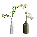 Decorative White And Green Vases With White Flowers And Green Leaves