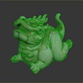 Traditional Jade Mythical Beast Carving With White And Brown Details In Crouching Posture