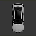 Silver Sports Coupe With Black Roof Rear Spoiler And Aerodynamic Design Features