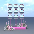 Pink Pillars With Round Mirrors And Pink Base Photo Spot With Flowers And Blue Sky