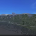 Modern Waterfront Stadium Building with Curved Roof Surrounded by Lake Greenery and Roads