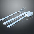 Modern Shiny Stainless Steel Cutlery Set Fork Knife Spoon On Black Surface