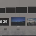 Multiple Wall Mounted And Standing Televisions Displaying Time And Cityscape Views 3d model