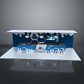 Scenery of Modern Exhibition Booth With White Countertop Blue Background And Cloud Like Decorations