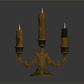 Golden Three Branched Candelabra With Lit Candles For Household Decoration