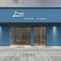 Tineast Store Exterior Featuring Blue Facade Glass Doors And Interior Displays