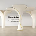 Organic Shaped White Columns with Yellow Accents in Modern Interior Design