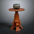 Rustic Wooden Pedestal Side Table With Gray Pottery Jar And Carved Base