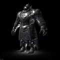Man In Metallic Full Body Armor With Ornate Shoulder Plates And Helmet