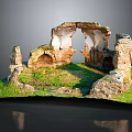 Weathered Ancient Ruins With Lush Green Grass And Stone Archway Structures