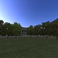 Modern Industrial Factory Building with Spacious Layout Surrounded by Green Trees and Parking Areas