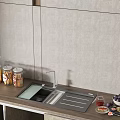 Modern Kitchen Sink With Wooden Countertop And Silver Faucet Near Glass Jars And Fresh Fruits