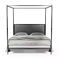 Modern Four Poster Double Bed With Upholstered Headboard And Striped Bed Linens