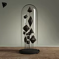 Decorative Ornament Set With Geometric Metal Pieces Inside Glass Dome On Wooden Tabletop