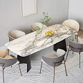 Stylish Dining Table Set With Marble Tabletop Gray Chairs Fruit Bowl And Green Plant