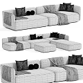 Modern Minimalist Sectional Sofa In Neutral Tones With Decorative Pillows Throw Blankets And Ottomans