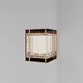 Modern Square Wall Light With Brass Metal Frame And Transparent Shade On Gray Corner Wall