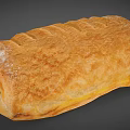 Golden Flaky Pastry With Striped Top Filled With Yellow Sweet Filling