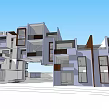 Modern Multi Story Building With Geometric Shapes Balconies And Blue Sky