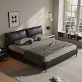 Modern Black Leather Double Bed With Light Colored Bedding Nightstand And Wall Art