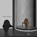 Stylish Black and Brown Leisure Chairs on Circular Platform With Gray Wall Background