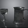 Intricate Carved Silver Chalice With Cross Pattern And Tankard Handle Detail