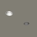 Two Recessed Spotlights Mounted on Ceiling One Illuminated One Unlit