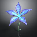 Vibrant Blue Flower With Shiny Petals And Green Stem On Dark Background