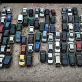 Various Colored Cars Different Models Parked In Outdoor Parking Lot