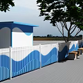 Blue And White Wavy Pattern Fence With Benches Trees And Waterfront View