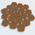 Collection of Braided Knot Shaped Rugs Neatly Arranged On White