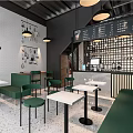 Modern Milk Tea Shop Interior with Green Seats White Tables and Black Metal Decor