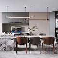 Modern Open Kitchen And Dining Area With Marble Countertop Pendant Lights And Chairs