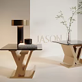 Modern Glass Top Side Table With Golden X Shaped Base And Decorative Plant