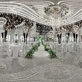 Elegant Banquet Hall With Chandeliers White Tables Green Floral Decorations And Central Flower Pathway