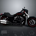Black Motorcycle with Red Accent Wheels Black Leather Seat Chrome Exhaust Pipes Modern Cruiser Design