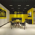 Tangeche Store Interior With Yellow Chairs Round Tables And Reception Desk