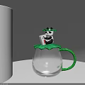 Transparent Glass Cup With Green Handle And Panda Doll Holding Small Box