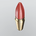 Detailed Golden Bullet With Red Tip Isolated On Light Background