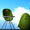 Green Children's Chair With Penguin Shaped Figure On Blue Water Background
