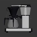 Sleek Black And Silver Coffee Maker Kitchen Appliance With Glass Carafe And Transparent Water Tank