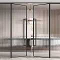 Modern Interior Space With Open Ribbed Glass Partition And Dining Area